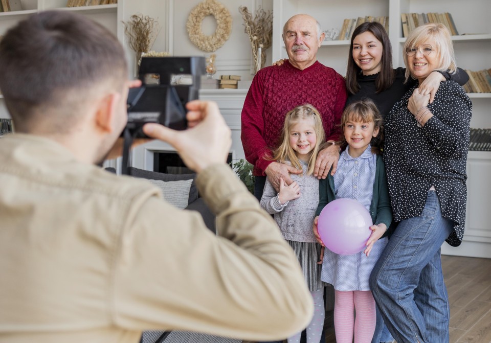 man taking photos with camera